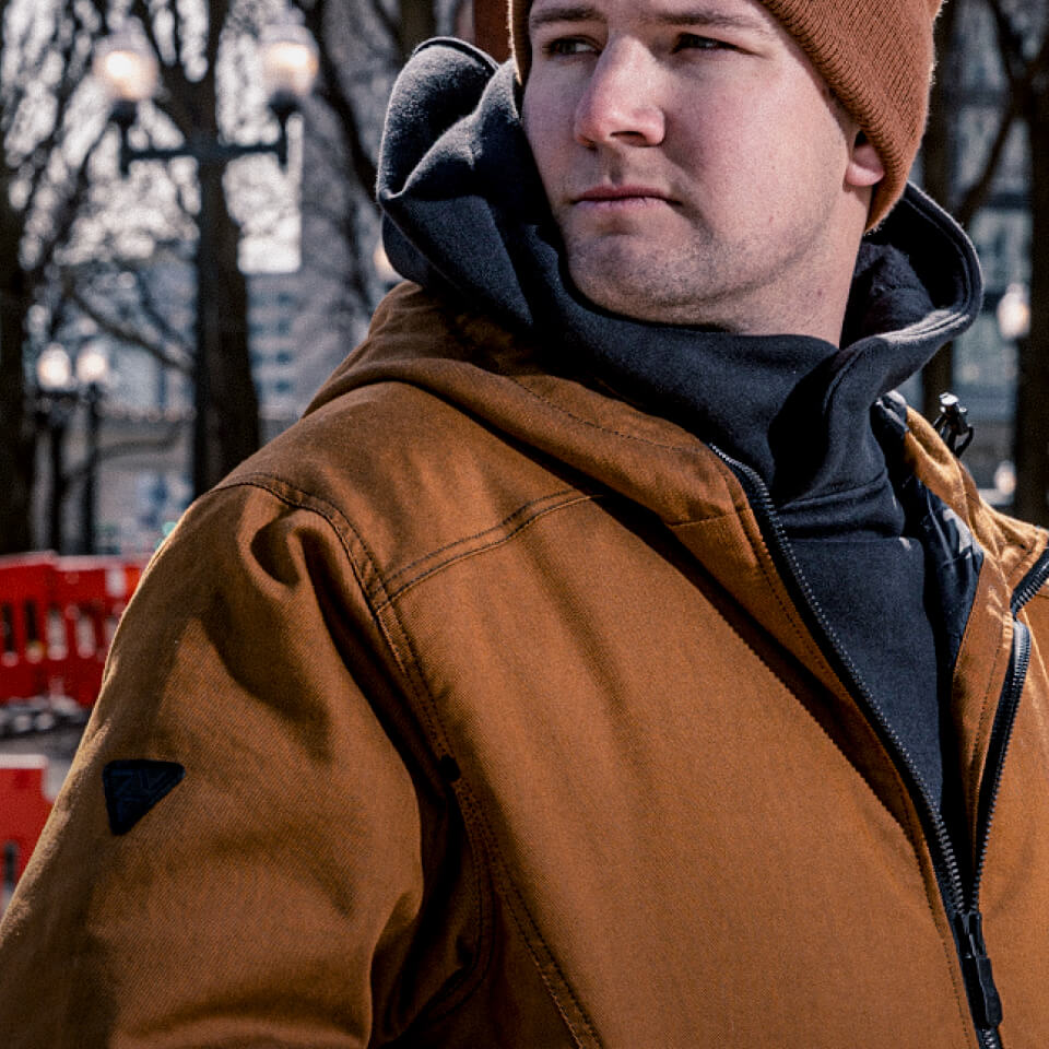 Worker wearing Vohl’s quilted utilty jacket
