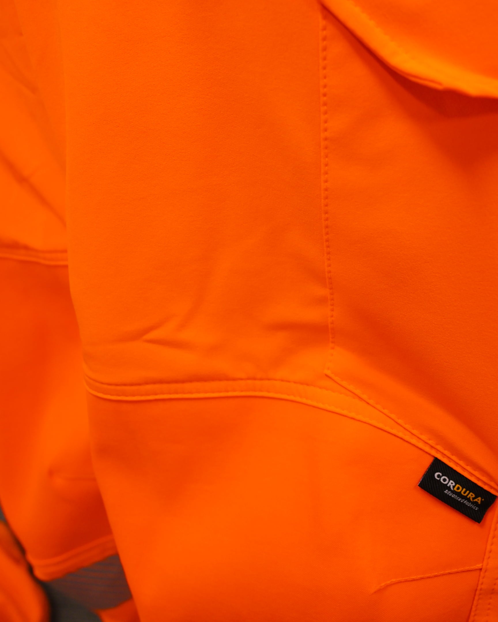 Vohl Hi Vis Jogger Pant – Safety Orange – SKU HV-JG-205, Cordura® reinforced fabric detail close-up | color:safety-orange