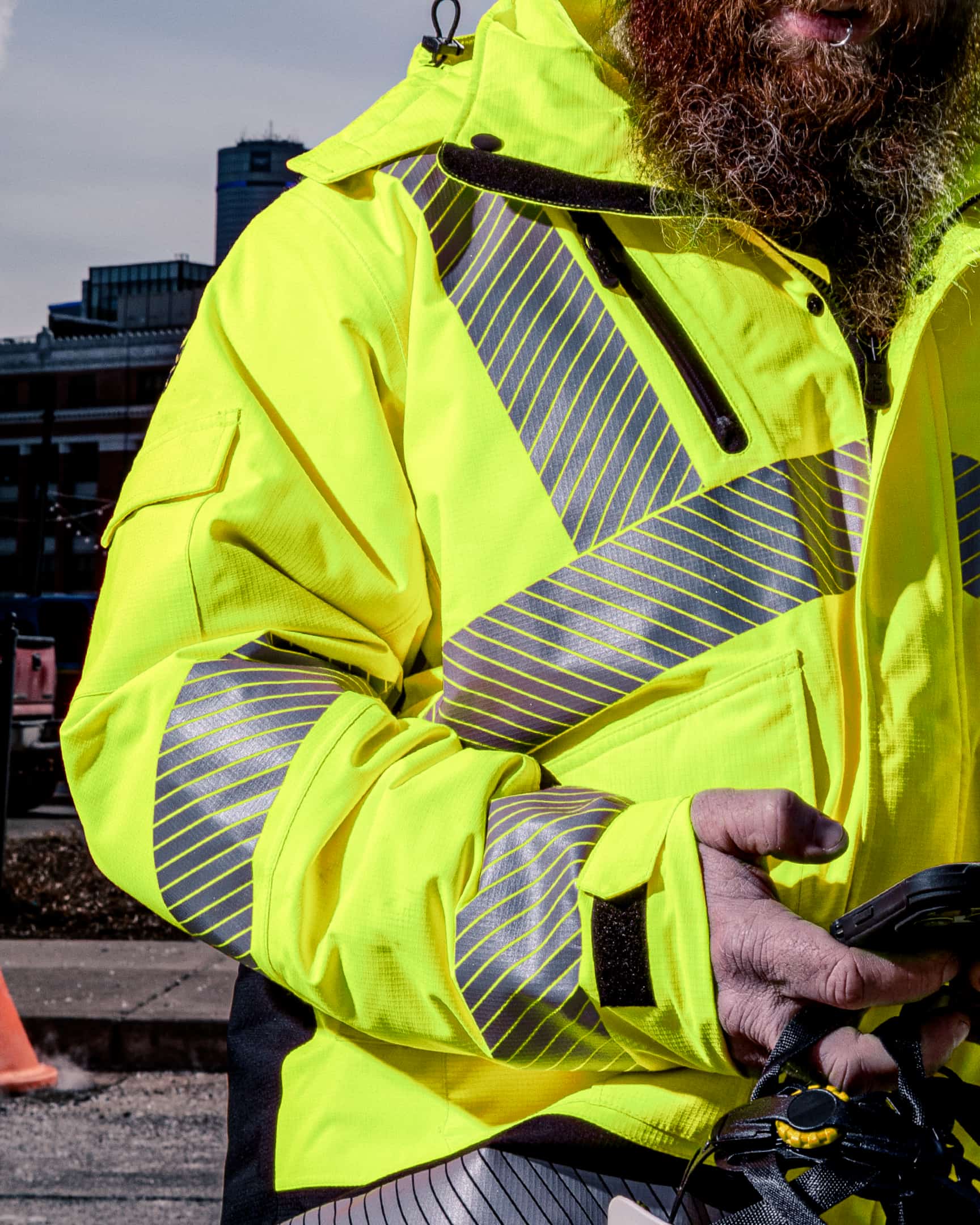 Close-up of hi-vis yellow insulated waterproof jacket with reflective detailing and zip pocket – SKU HV-IJ-105 | color:safety-yellow