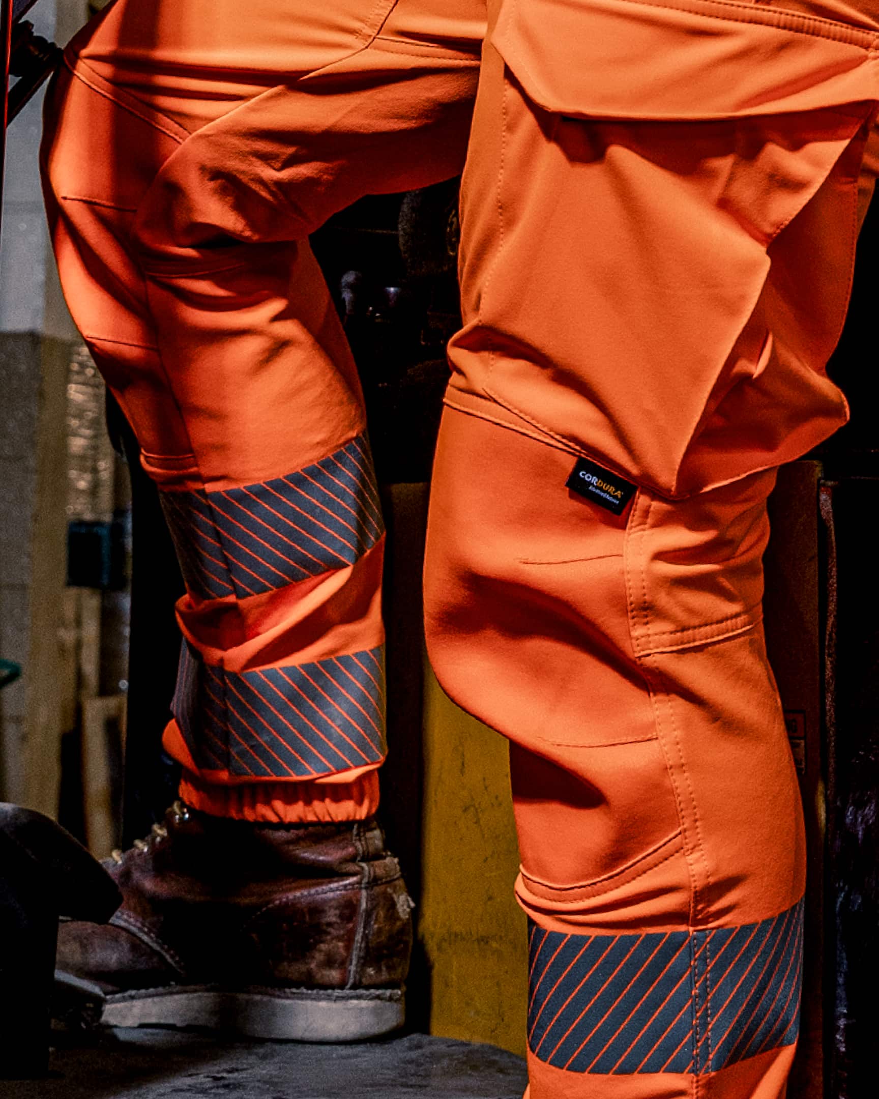 Vohl Hi Vis Jogger Pant – Safety Orange – SKU HV-JG-205, lifestyle closeup | color:safety-orange