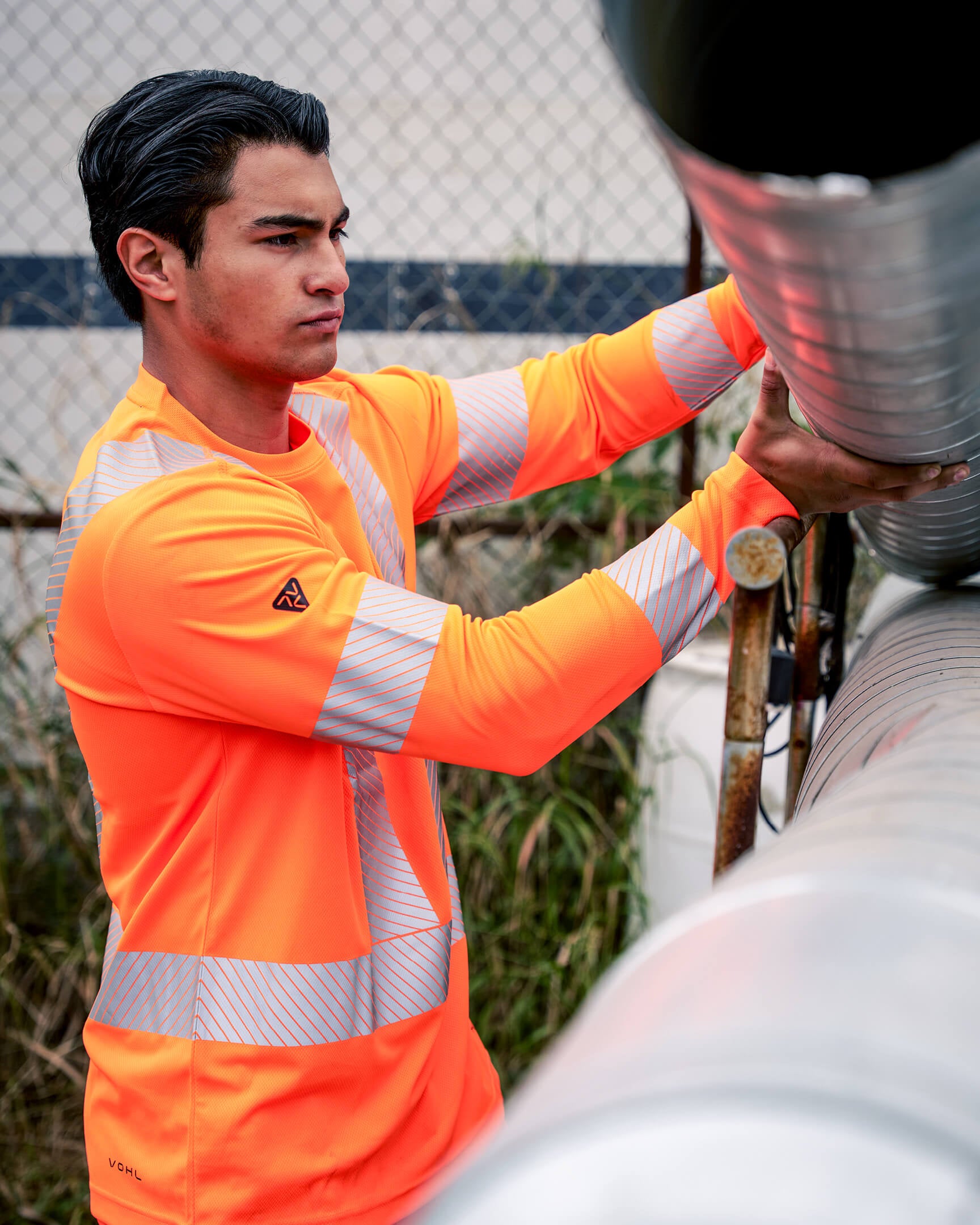 VOHL Hi Vis Reflective Long Sleeve T-Shirt – Safety Orange highlighting reflective detailing and comfortable fit during active work | color:safety-orange