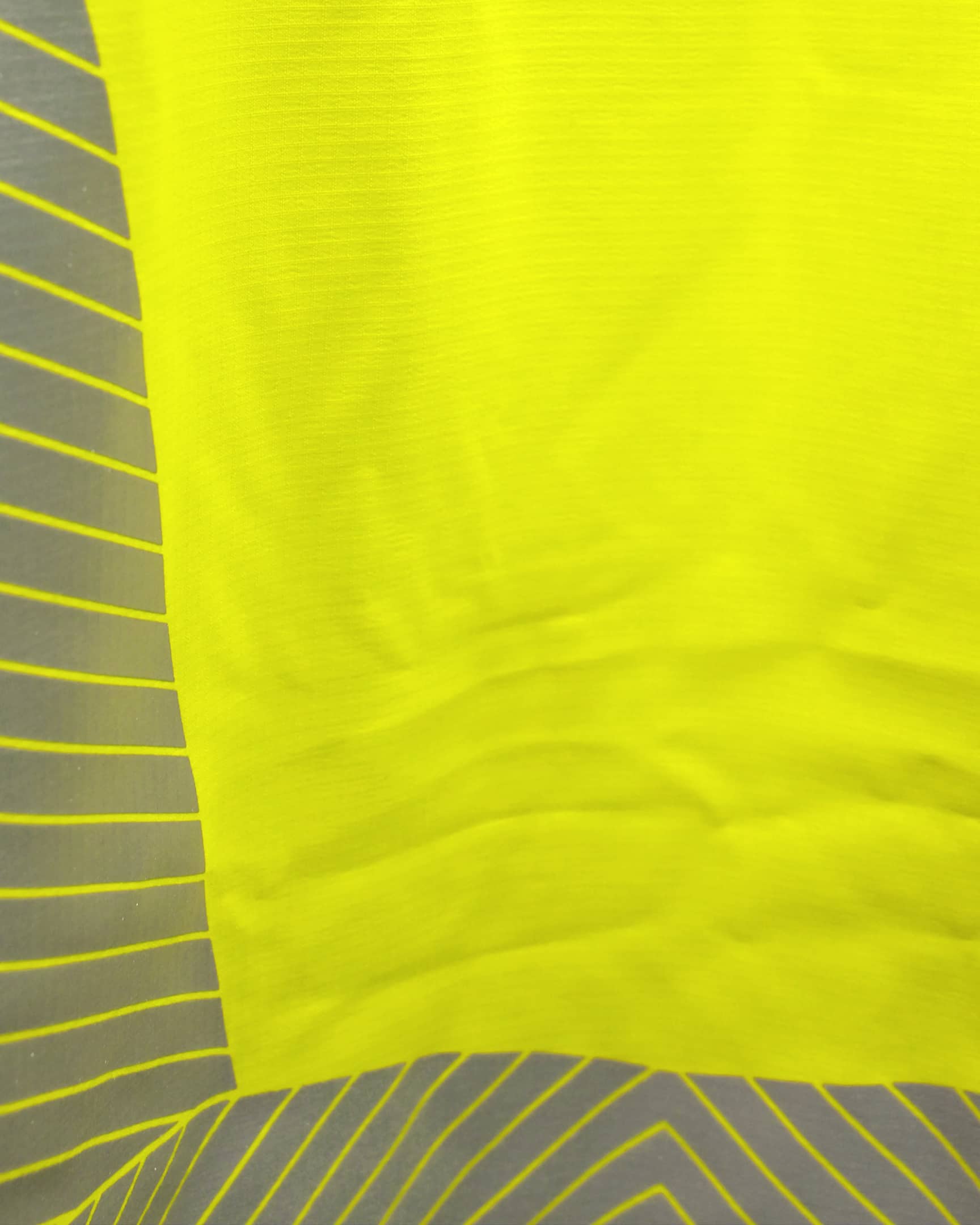 Vohl Hi Vis Waterproof Shell Jacket - Safety Yellow - SKU HV-SJ-105, waterproof ripstop fabric close-up with reflective print detail | color:safety-yellow