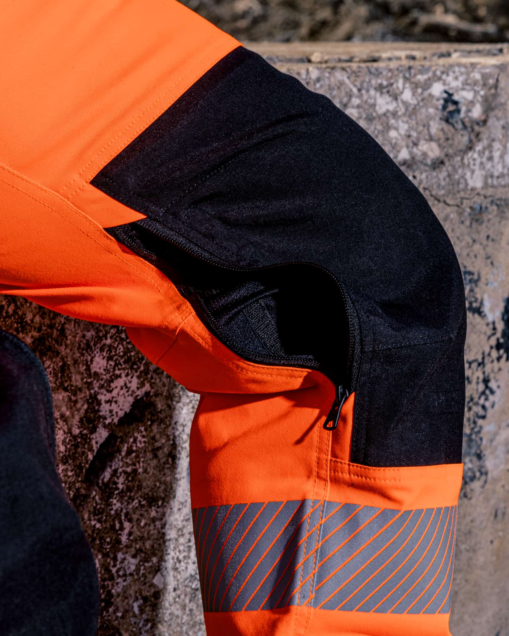 Vohl Hi Vis Utility Pant – Safety Orange – SKU HV-UP-205, lifestyle close-up | color:safety-orange