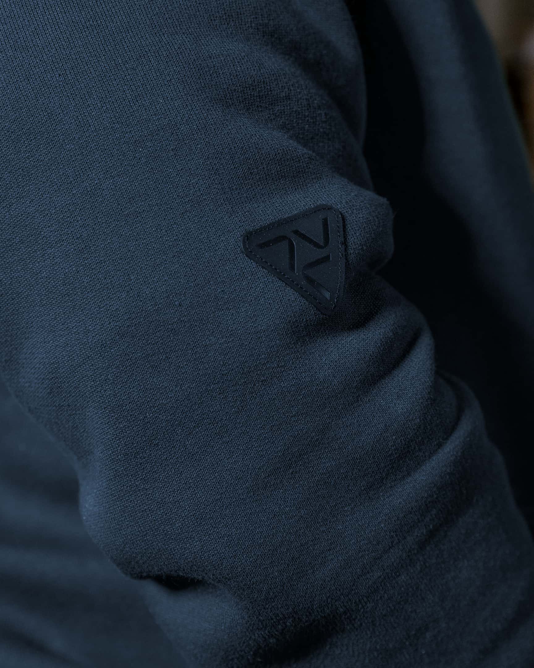 Close-up of blue heavyweight fleece hoody sleeve pocket with zipper and pen slot – SKU WW-PO-600 | color:detroit-blue