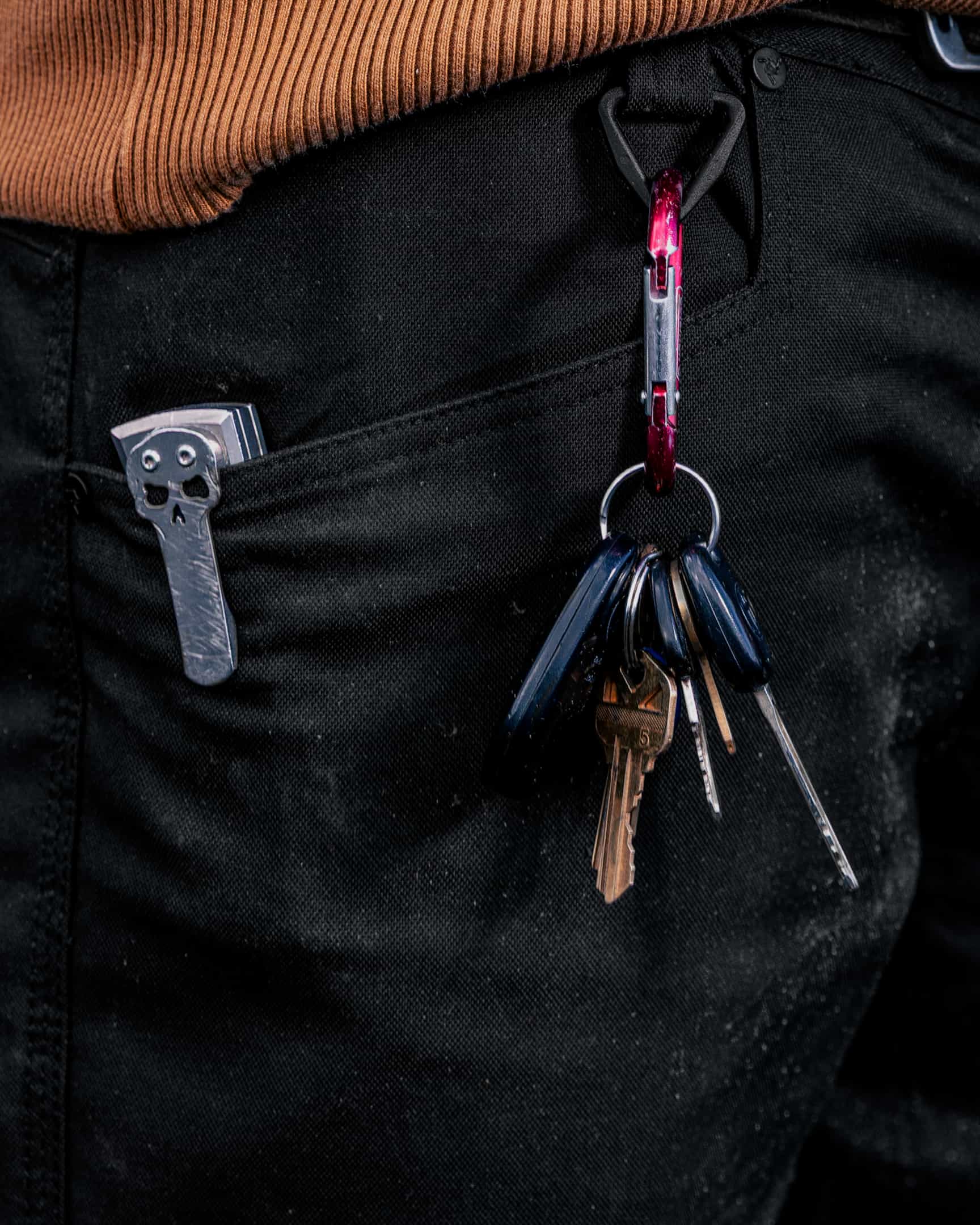 Close-up of black straight leg work pants pocket with keys clipped to D-ring and tool pocket – SKU WW-SP-900 | color:black